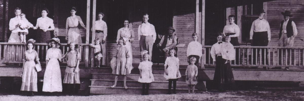 Haynie and Wood families, and some neighbors, in front of "the Haynie hotel" in Richards, about 1911.