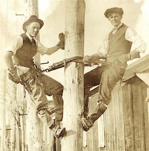 Rex and Ross Ward pose in a photography studio, about 1918